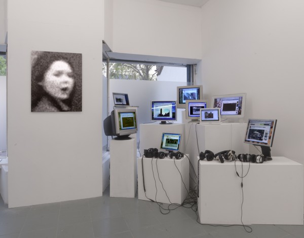 John Smith, unusual Red cardigan, installation view at PEER, London, 2011. Photo: Chris Dorley-Brown.
