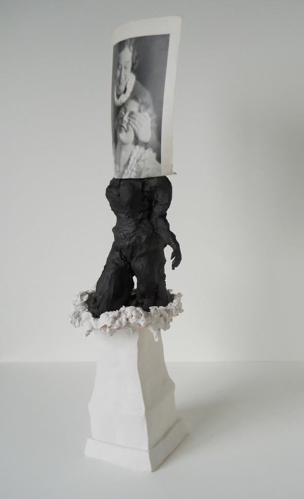 Cynthia Lahti. Surprise, 2013; ceramic with paper image. 23 x 8 x 6 in. Courtesy of the Artist.