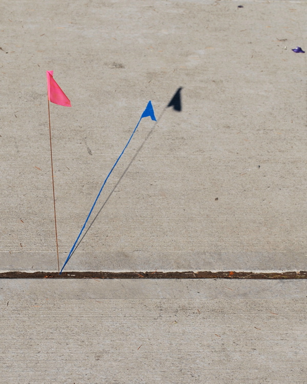 Joe Penrod. Three Flags, 2011; found flag, painter’s tape; dimensions variable. Courtesy of the artist.