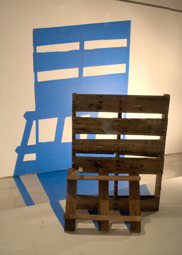 Joe Penrod. Pallet/Palette, 2010; painter’s tape and wooden pallets; dimensions variable. Courtesy of the artist.