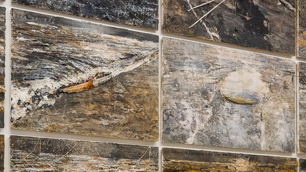 Two panels from Velimir Chlebnikov, which resemble the open ocean of naval warfare, at times seem to shift in scale to reveal a pond, cove, or estuary with model ships. Velimir Chlebnikov, 2004 (detail); steel pavilion, 300 x 330 x 689 in.; 30 paintings, oil, emulsion, acrylic, lead and mixed media on canvas; 18 paintings, 75 x 130 in.; 12 paintings, 75 x 110 in. Courtesy of MASS MoCA, North Adams, MA, and Hall Art Foundation, New York. Photo: Saul Rosenfield.