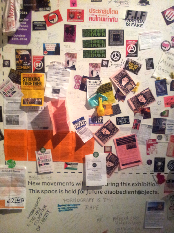 Detail of the installation of pamphlets, souvenirs, and protest ephemera. The Victoria & Albert Museum, London. Photo: Jordan Amirkhani.