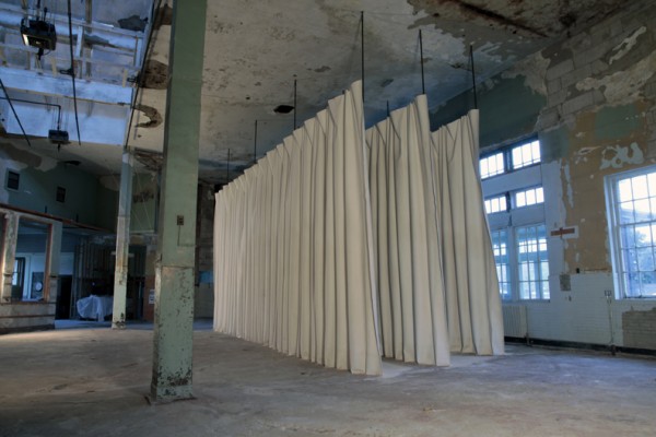 Ian McMahon. Momentary Repetition, 2014; Freestanding cast plaster, steel; 30 x 15 x 17 ft.