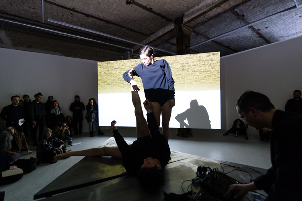 Ground Control: An interdisciplinary forum, installation view, PSM Gallery, Berlin. Front: Sigal Zouk, Jan Burkhardt, & Andreas Reihse, Ground Control, 2015; performance. Back: Awst & Walther, Ground Control, 2015 (detail); digital animation. Courtesy of the Artists and PSM Gallery, Berlin. Photo: André Wunstorf.