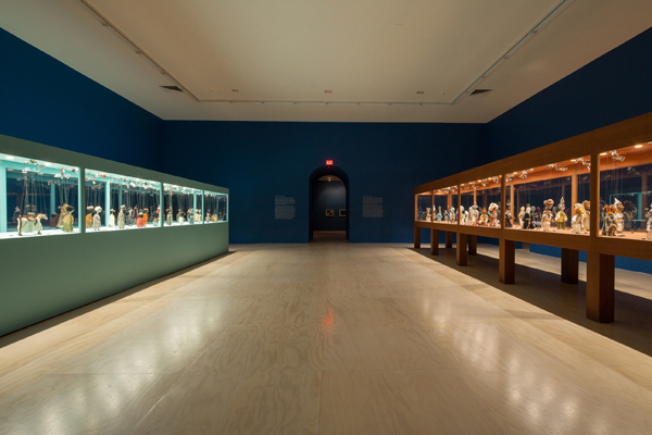 Wael Shawky. Wael Shawky: Cabaret Crusades, 2015; installation view, MoMA PS1, New York, featuring vitrines of marionettes from Cabaret Crusades: The Path to Cairo, 2012, and Cabaret Crusades: The Secrets of Karbala, 2015. Courtesy of the Artist and MoMA PS1, New York. Photo by Pablo Enriquez.