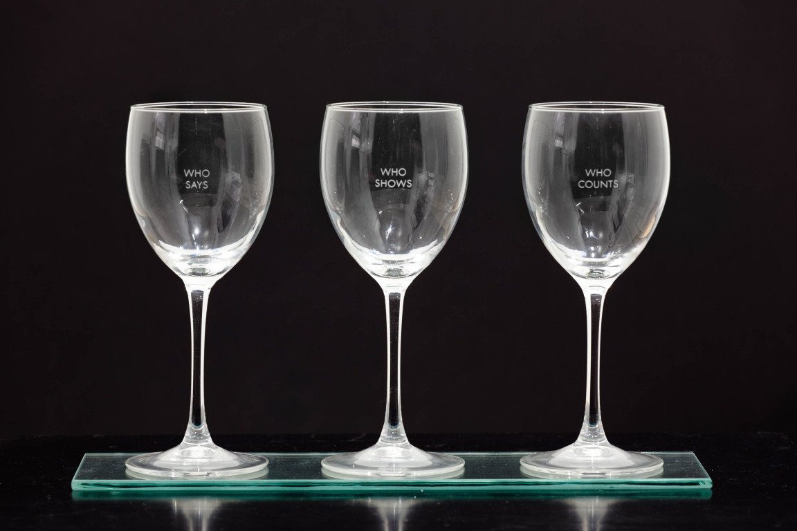 Louise Lawler. Who Says, Who Shows, Who Counts, 1990; set of three Chablis glasses with glass shelf and brackets; 8.50 x 14.00 x 4.25 in.