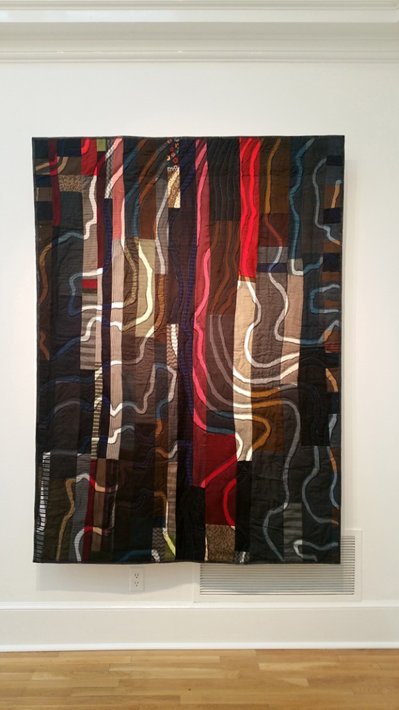 Jess Jones. Topoquilt: Mechanicsville, 2017; found quilt top (by unknown artist), hand-dyed silk organza; 77 x 56 inches. Image courtesy of the artist and Swan Coach House Gallery (Atlanta, GA).